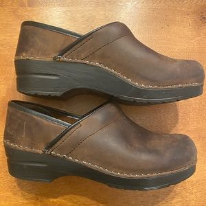 Dansko Professional brown leather clogs.